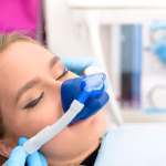 A woman getting sedation dentistry treatments at our dental clinic in London