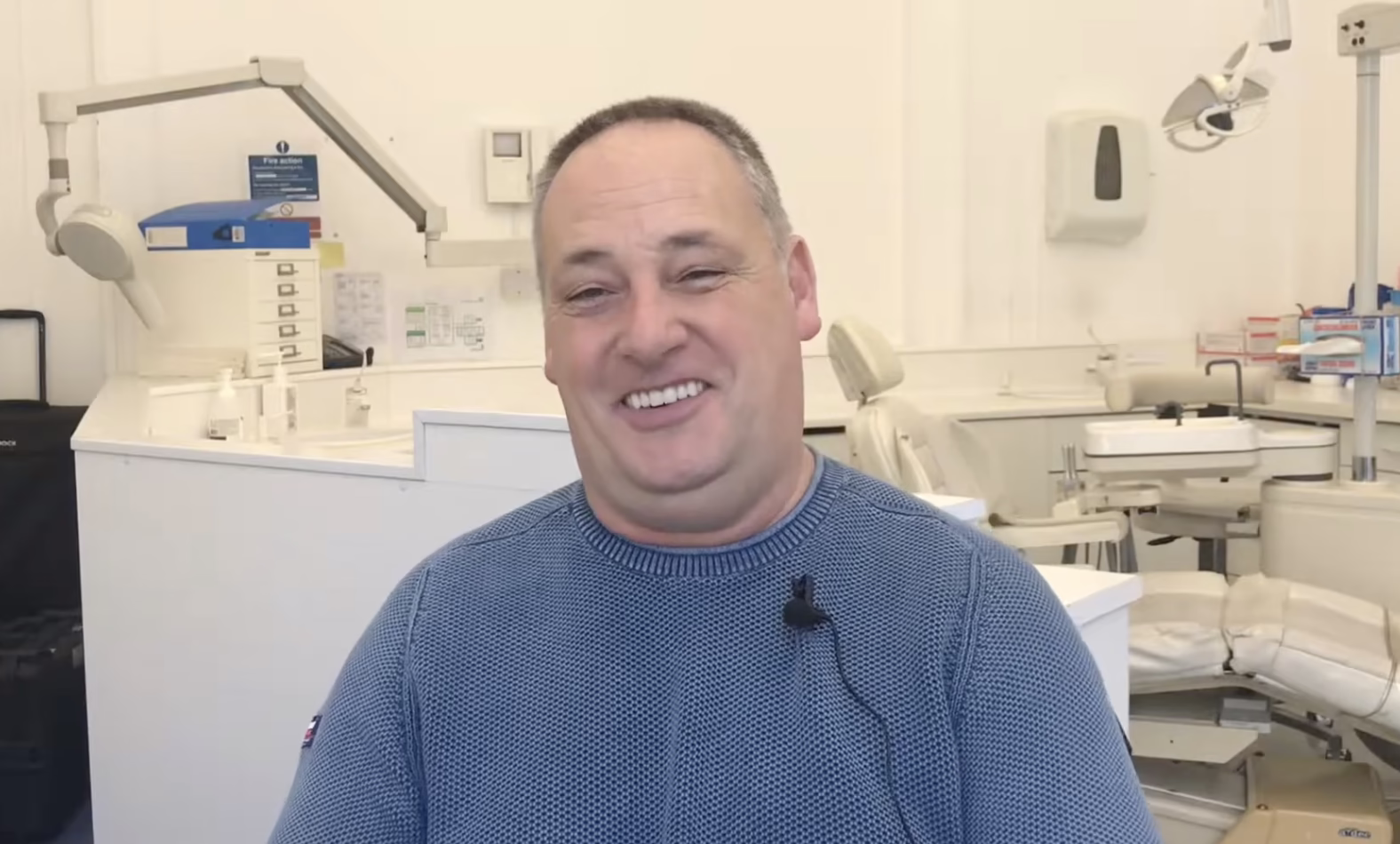 Satisfied dental patient showing beautiful smile