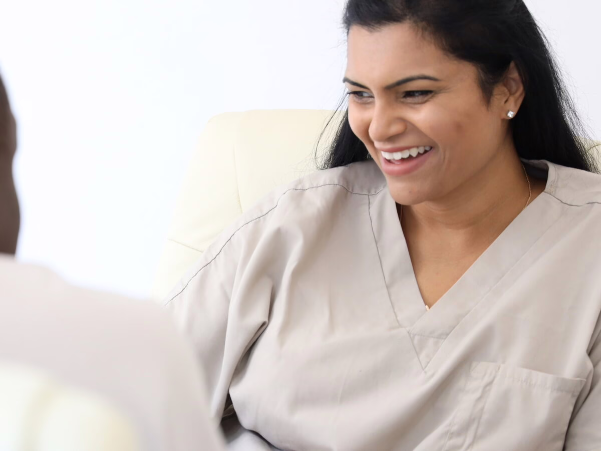 Dr Neha Patel, specialist endodontist, in discussion with Dr Ope Sodeinde