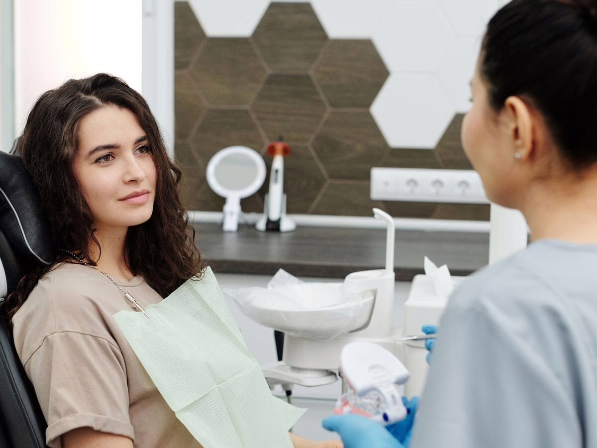 A patient in conversation with a clinician