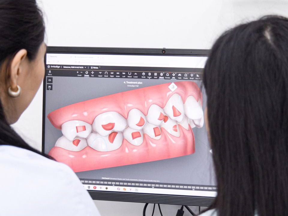 A dental scan explained to a patient on screen