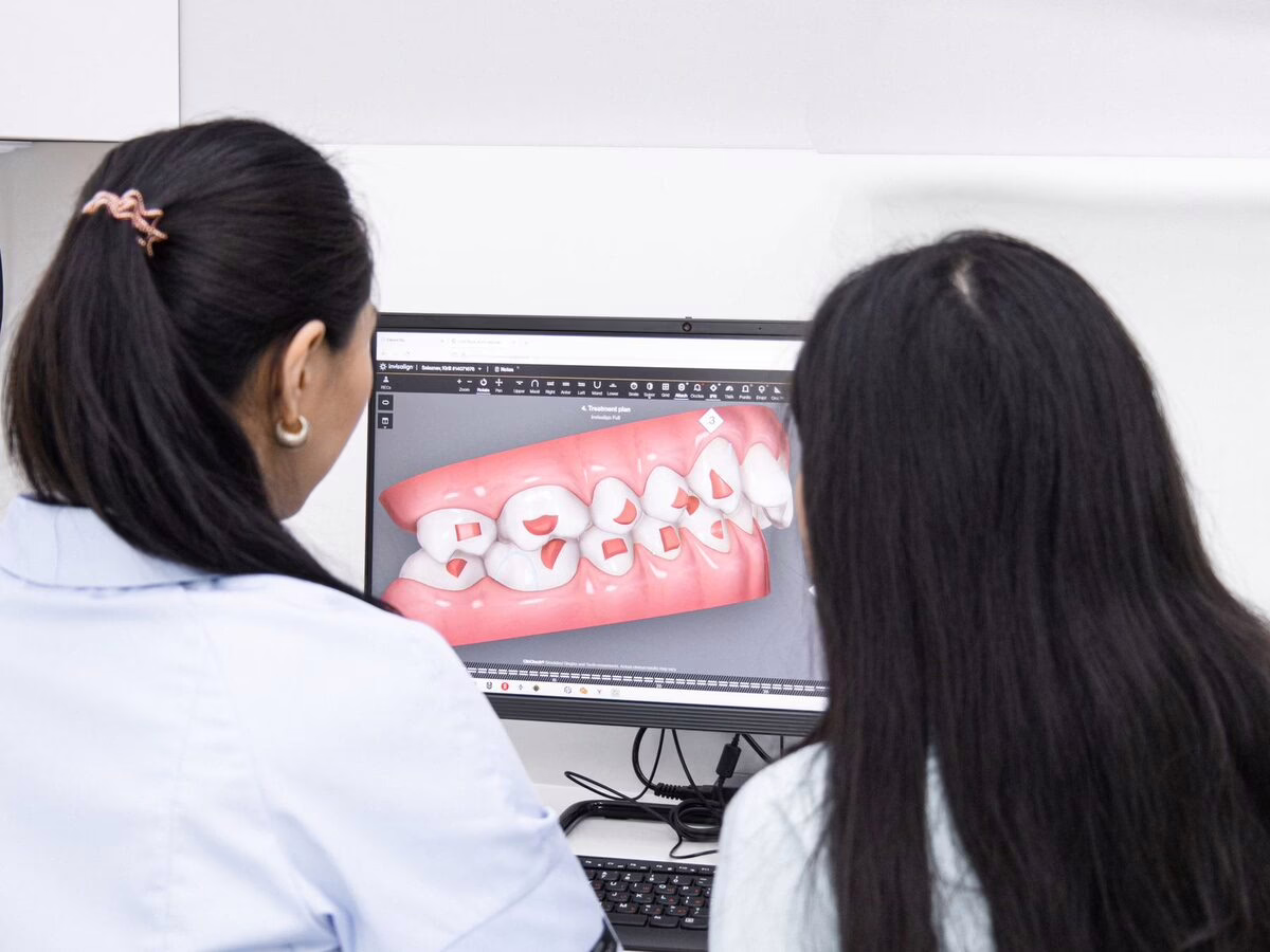 A dental scan explained to a patient on screen